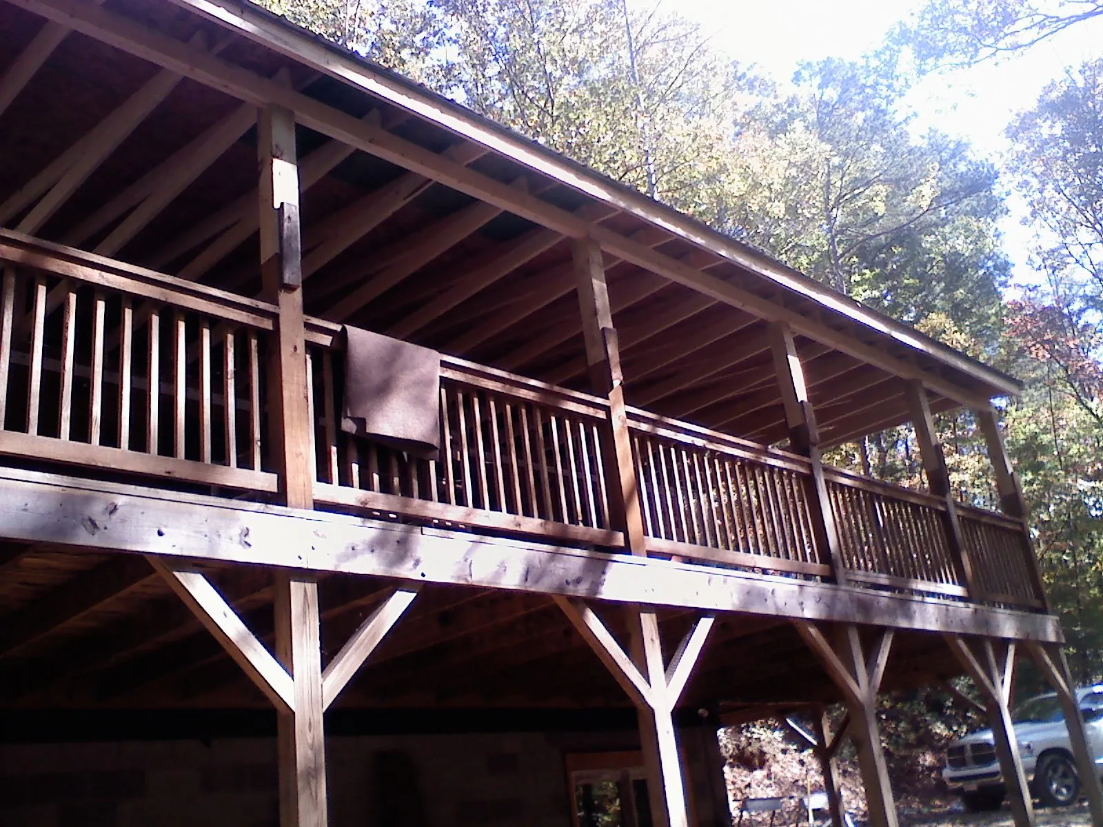 Timber framing under a new elevated porch and deck — Roof Leak Repair in Allen by Roofing Brothers